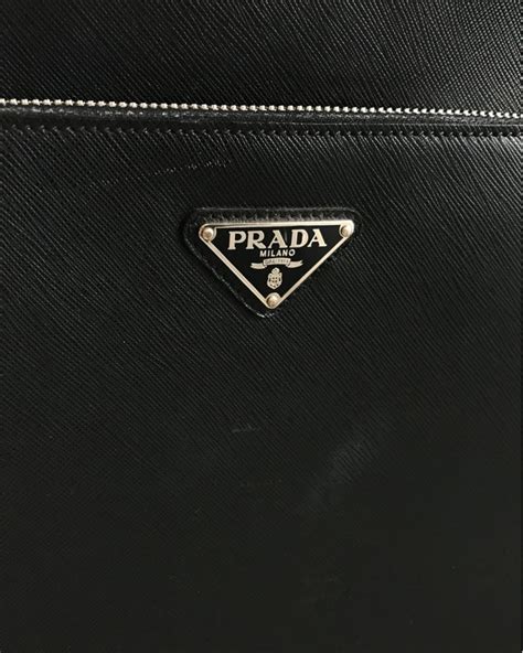 prada mala|Prada bolsas.